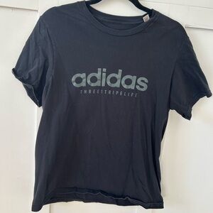 Adidas Black T-Shirt Green writing size medium